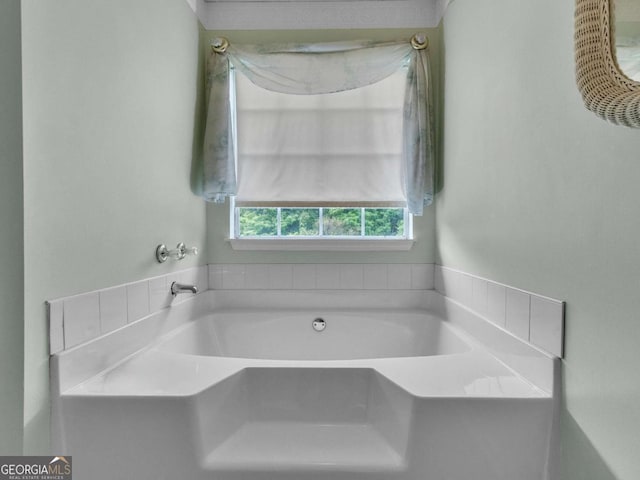 bathroom with a garden tub