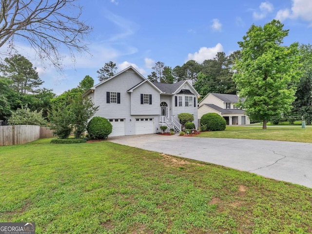 bi-level home featuring driveway and a garage