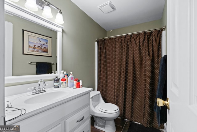 1377 Downington Ln NW, Acworth, GA 30101 - full bath featuring vanity, toilet, tile patterned floors, and a shower with shower curtain