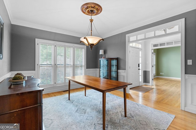 1377 Downington Ln NW, Acworth, GA 30101 - home office featuring crown molding, light wood-style floors, and a wainscoted wall