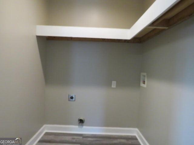 2 4th St, Cedartown, GA 30125 - laundry room featuring hookup for a washing machine, electric dryer hookup, baseboards, and wood finished floors