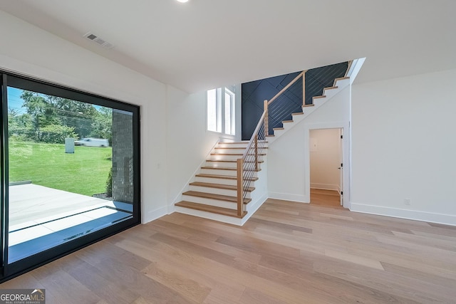 972 Auburn Rd, Dacula, GA 30019 - foyer featuring stairs, plenty of natural light, and light wood-type flooring