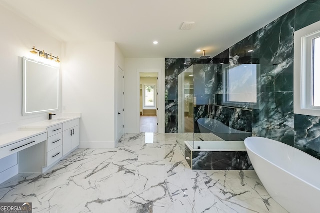 972 Auburn Rd, Dacula, GA 30019 - bathroom featuring a marble finish shower, a soaking tub, vanity, recessed lighting, and marble tiled floors