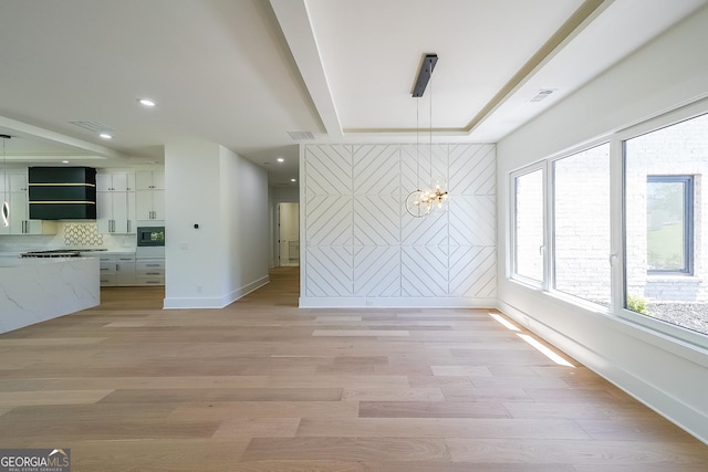 972 Auburn Rd, Dacula, GA 30019 - unfurnished dining area with baseboards, a chandelier, light wood-style floors, and recessed lighting