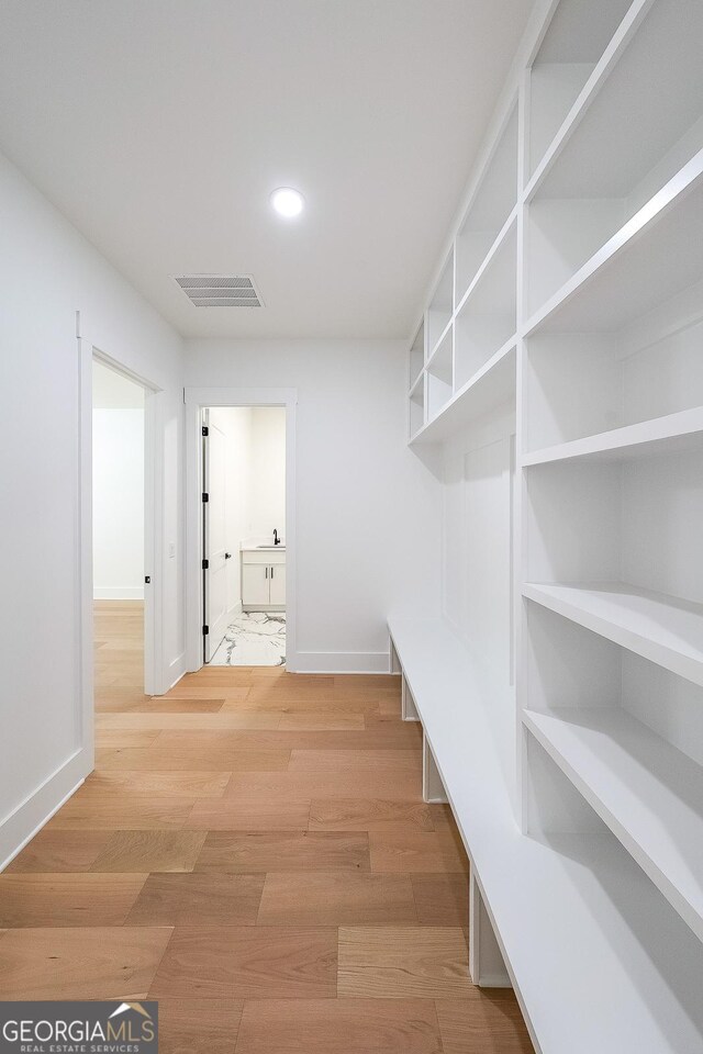 972 Auburn Rd, Dacula, GA 30019 - mudroom with light wood finished floors, baseboards, and recessed lighting