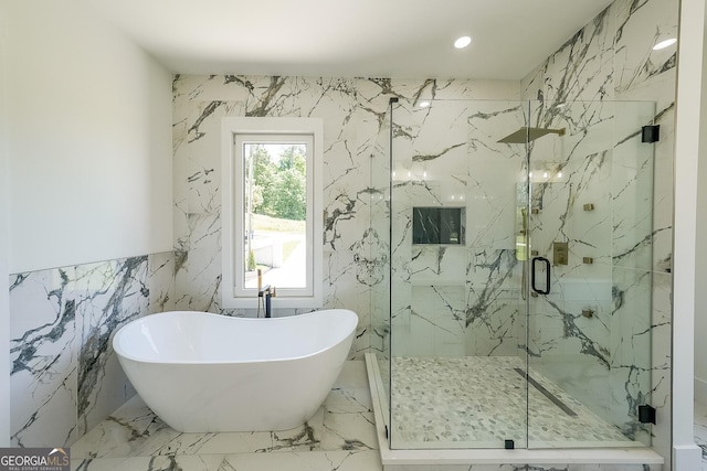972 Auburn Rd, Dacula, GA 30019 - full bath with a freestanding tub, a marble finish shower, marble tiled flooring, tile walls, and recessed lighting