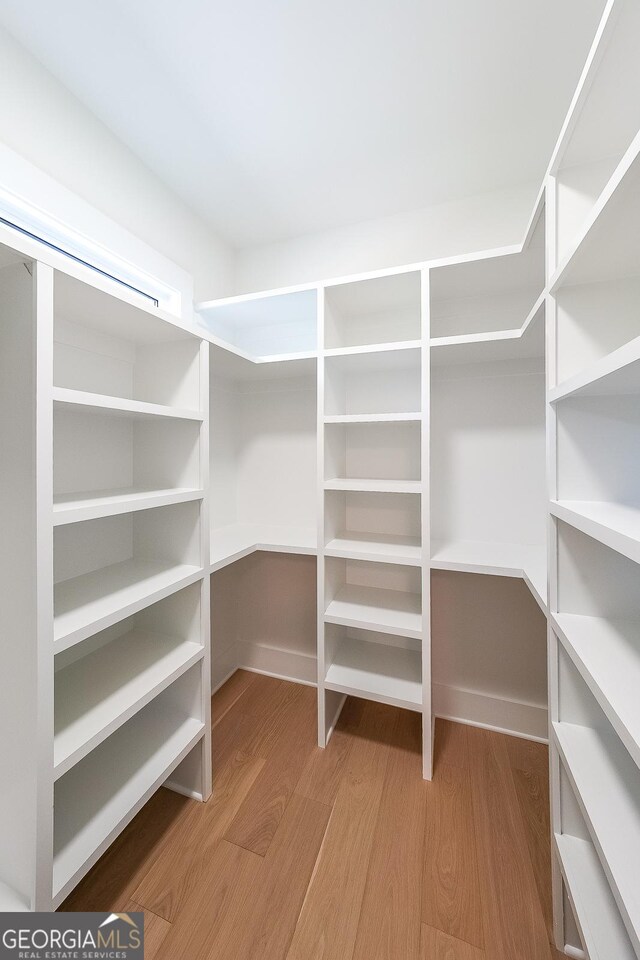 972 Auburn Rd, Dacula, GA 30019 - spacious closet with wood finished floors