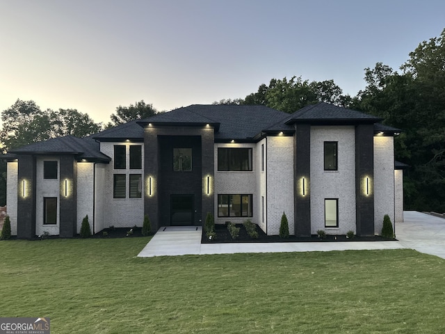 972 Auburn Rd, Dacula, GA 30019 - prairie-style house featuring a front lawn