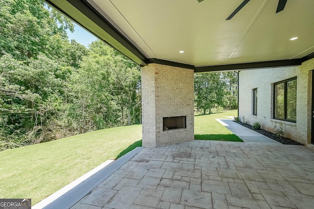 972 Auburn Rd, Dacula, GA 30019 - view of patio / terrace featuring an outdoor brick fireplace
