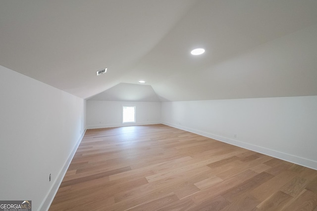 972 Auburn Rd, Dacula, GA 30019 - additional living space featuring lofted ceiling, baseboards, light wood finished floors, and recessed lighting