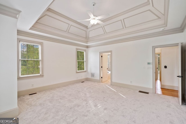 300 Hemlock Cv, Ball Ground, GA 30107 - carpeted spare room with healthy amount of natural light, a ceiling fan, crown molding, and a raised ceiling