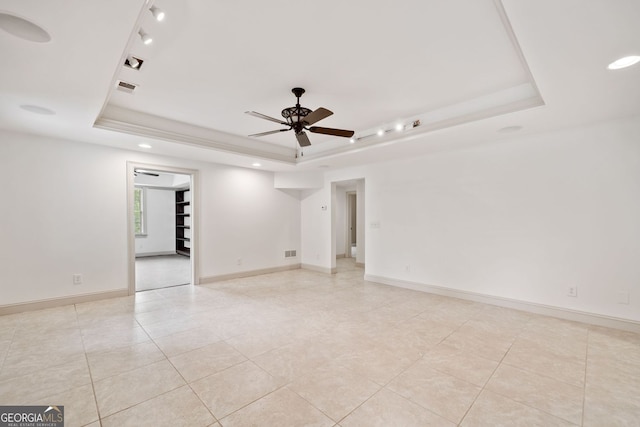 300 Hemlock Cv, Ball Ground, GA 30107 - empty room featuring a tray ceiling, light tile patterned flooring, recessed lighting, a ceiling fan, and baseboards