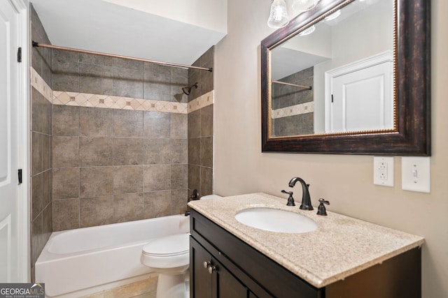 bathroom featuring shower / bath combination, vanity, and toilet