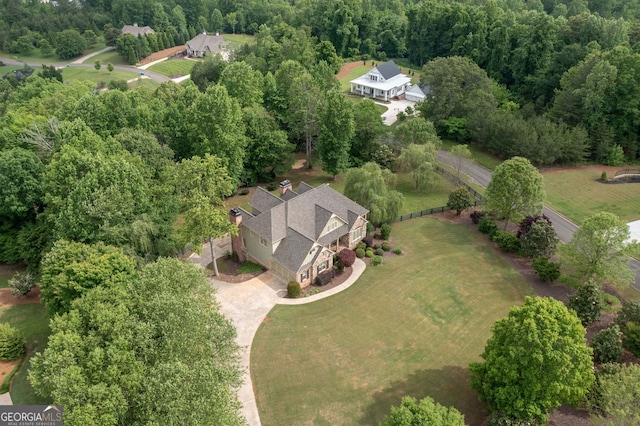 aerial overview of property's location featuring a forest