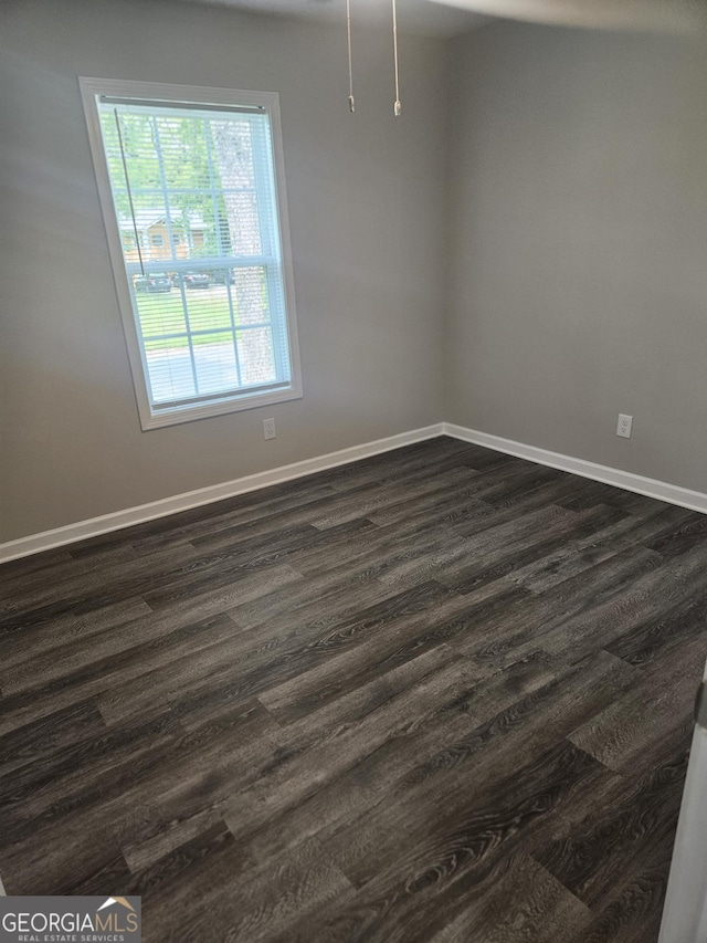 414 E 17th St SW, Rome, GA 30161 - spare room featuring dark wood finished floors and baseboards