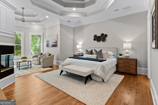 3905 Merriweather Woods, Johns Creek, GA 30022 - bedroom with wood finished floors, ornamental molding, a tray ceiling, baseboards, and recessed lighting