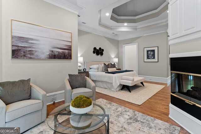 3905 Merriweather Woods, Johns Creek, GA 30022 - bedroom featuring ornamental molding, wood finished floors, baseboards, a raised ceiling, and recessed lighting