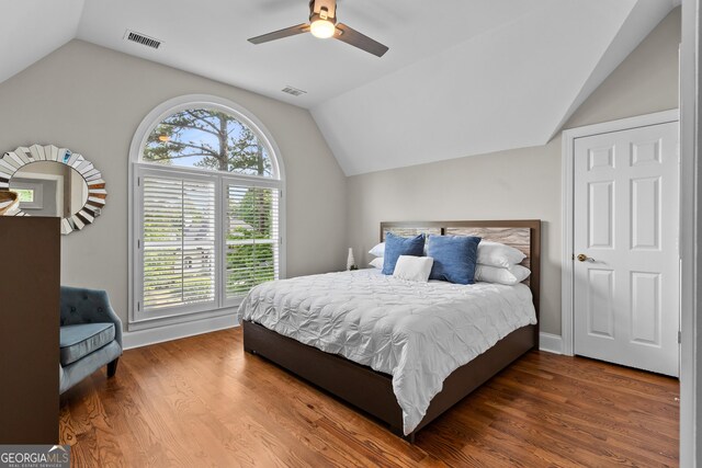 3905 Merriweather Woods, Johns Creek, GA 30022 - bedroom featuring vaulted ceiling, wood finished floors, and ceiling fan