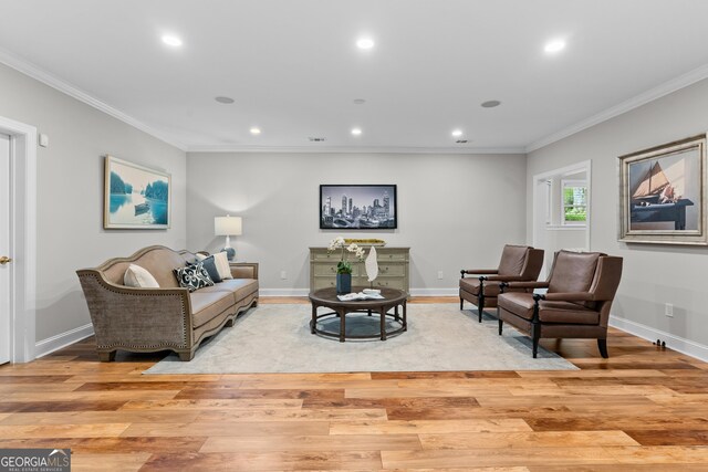 3905 Merriweather Woods, Johns Creek, GA 30022 - living area with light wood-style floors, crown molding, recessed lighting, and baseboards