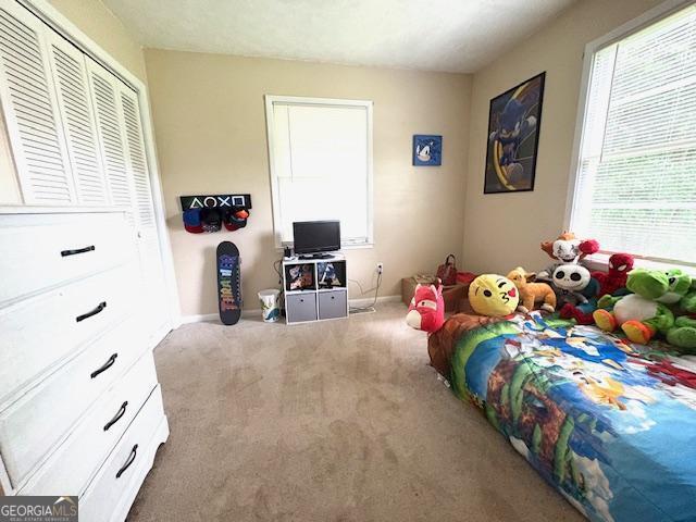 123 Hillview Dr, Thomaston, GA 30286 - carpeted bedroom with baseboards