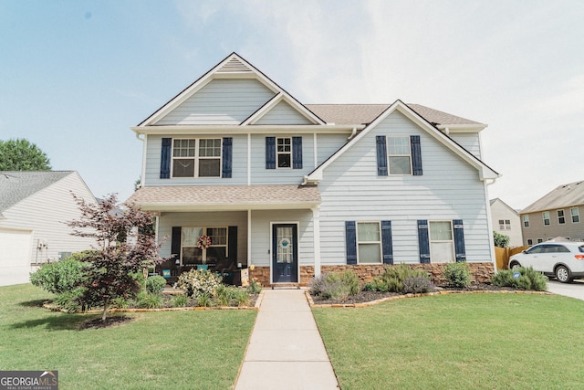 258 Creek View Ln, Acworth, GA 30102 - view of front of property with a porch, a front yard, stone siding, and a shingled roof
