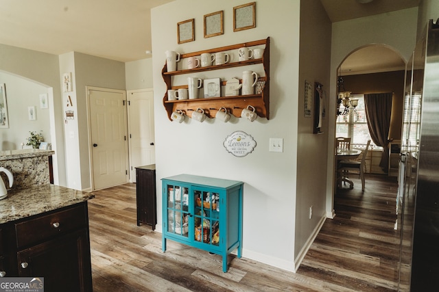 258 Creek View Ln, Acworth, GA 30102 - hallway with wood finished floors, arched walkways, and baseboards