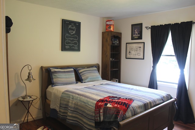 124 Wynn Rd, Mcdonough, GA 30252 - bedroom featuring wood finished floors