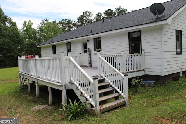 124 Wynn Rd, Mcdonough, GA 30252 - back of house with a wooden deck, roof with shingles, a yard, and stairs