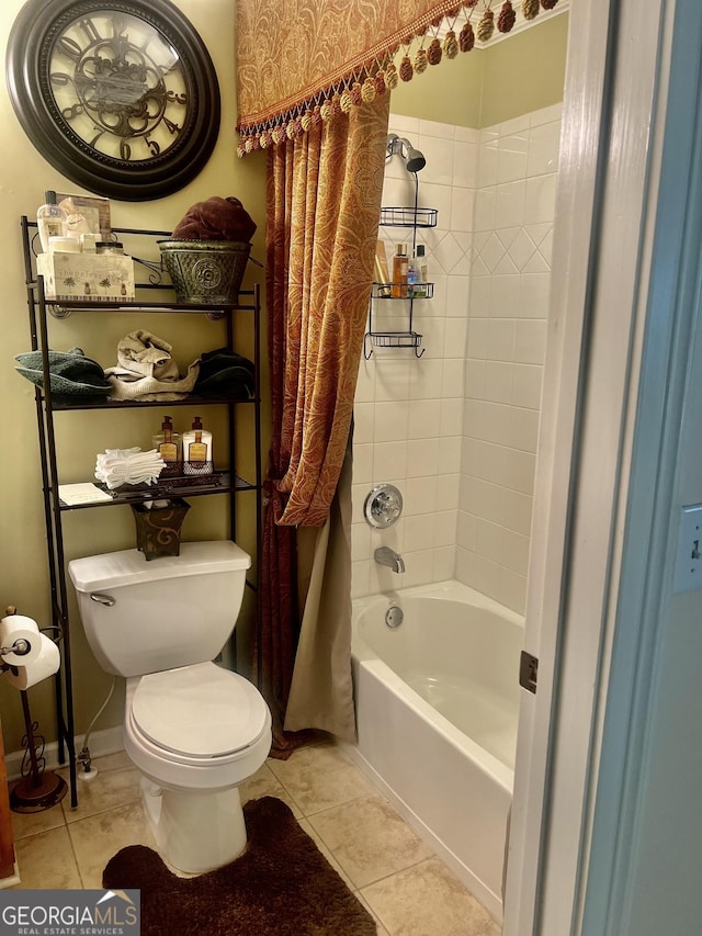 5430 Lemoyne Dr SW, South Fulton, GA 30331 - full bath featuring tile patterned floors, toilet, shower / bathtub combination with curtain, and baseboards