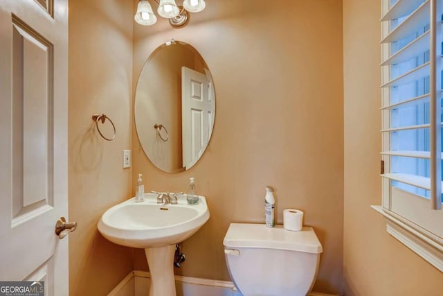 bathroom featuring toilet