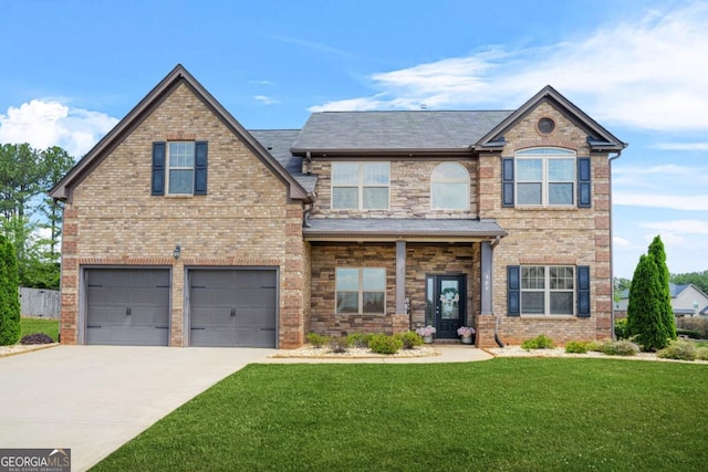 321 Shannon Ct, Mcdonough, GA 30252 - view of front of house featuring an attached garage, a front lawn, driveway, and brick siding