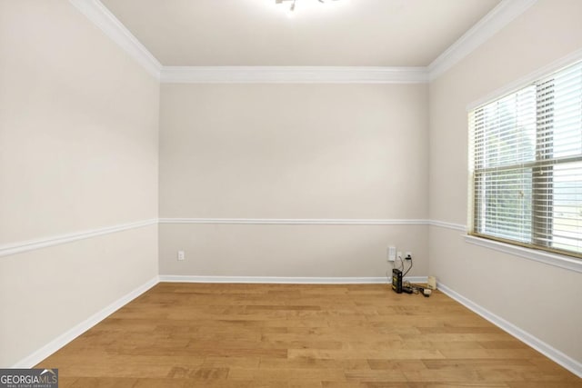 321 Shannon Ct, Mcdonough, GA 30252 - empty room featuring light wood-type flooring, crown molding, and baseboards