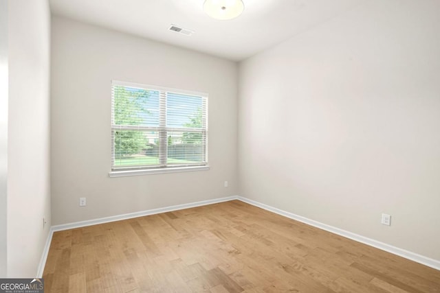 321 Shannon Ct, Mcdonough, GA 30252 - unfurnished room with light wood finished floors and baseboards