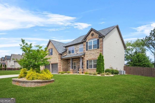 321 Shannon Ct, Mcdonough, GA 30252 - craftsman house with central AC, an attached garage, and stone siding