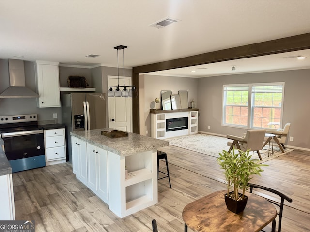 kitchen featuring stainless steel electric range, wall chimney exhaust hood, open shelves, white cabinetry, and beamed ceiling