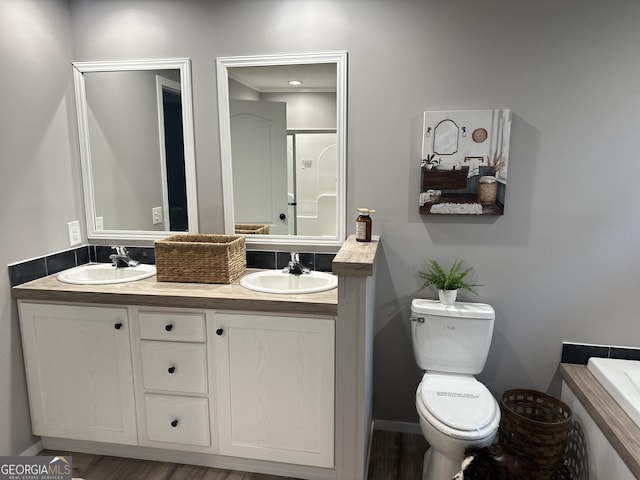 2093 Double Bridge Rd, Demorest, GA 30535 - full bath featuring toilet, a shower with door, double vanity, and wood finished floors