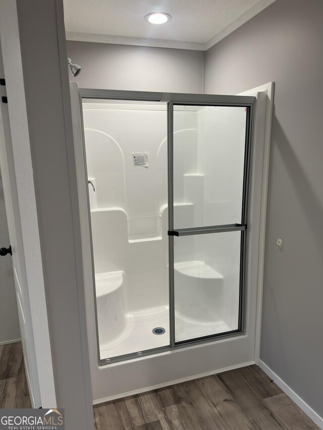 2093 Double Bridge Rd, Demorest, GA 30535 - full bath featuring a shower stall and wood finished floors