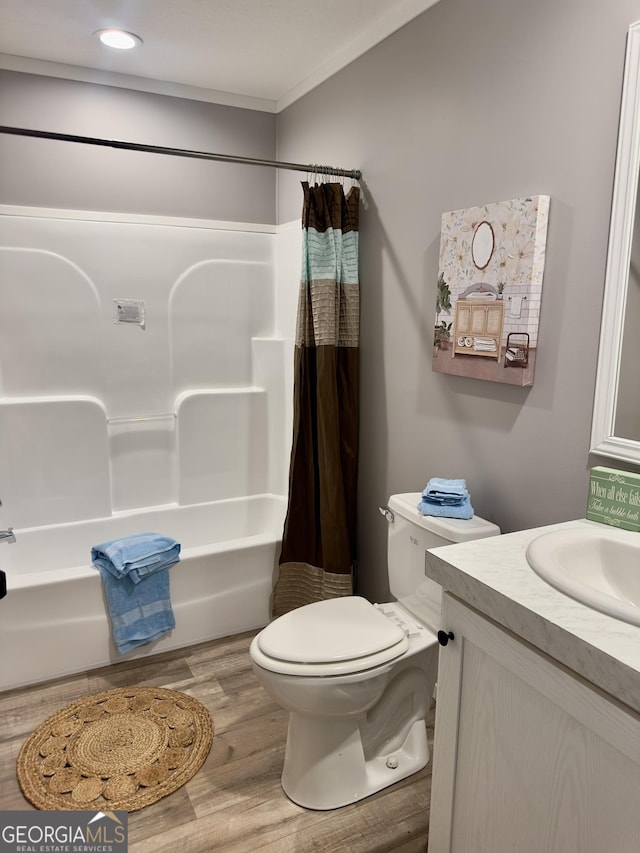 2093 Double Bridge Rd, Demorest, GA 30535 - bathroom with wood finished floors, toilet, shower / tub combo with curtain, vanity, and recessed lighting