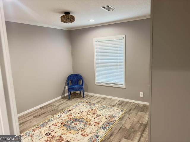 2093 Double Bridge Rd, Demorest, GA 30535 - unfurnished room with crown molding, wood finished floors, and baseboards