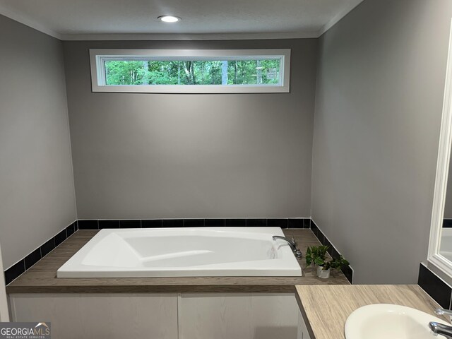 living area featuring baseboards, recessed lighting, wood finished floors, and crown molding