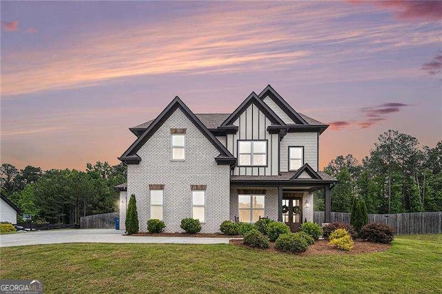 1660 Chandler Rd, Lawrenceville, GA 30045 - view of front of house with board and batten siding and concrete driveway