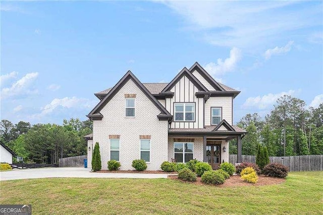 1660 Chandler Rd, Lawrenceville, GA 30045 - craftsman house with board and batten siding, concrete driveway, and brick siding