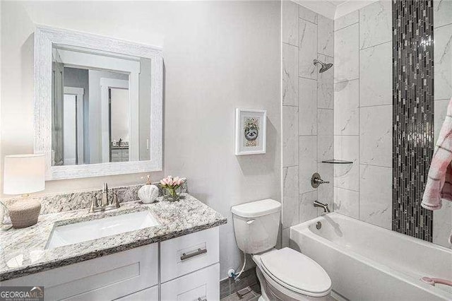 1660 Chandler Rd, Lawrenceville, GA 30045 - bathroom with vanity, toilet, and bathing tub / shower combination