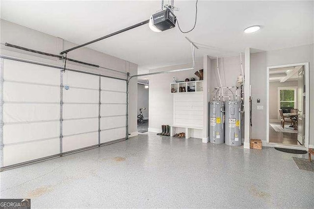 1660 Chandler Rd, Lawrenceville, GA 30045 - garage with electric water heater and a garage door opener