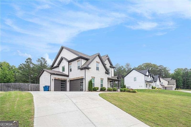 1660 Chandler Rd, Lawrenceville, GA 30045 - view of front facade featuring an attached garage and driveway