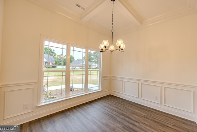 unfurnished dining area with crown molding, coffered ceiling, a chandelier, beam ceiling, and a decorative wall