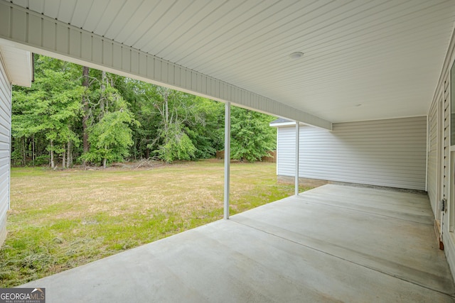 view of patio / terrace featuring a carport