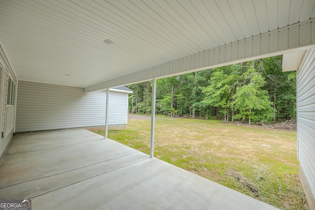 view of patio / terrace featuring a carport