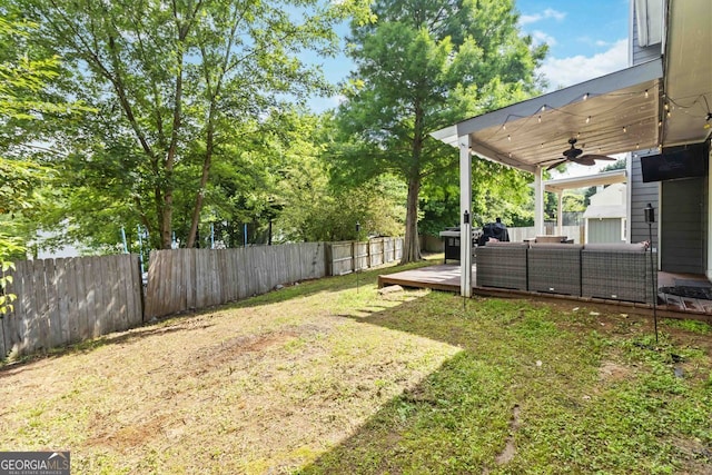 870 Underhill Ct, Sugar Hill, GA 30518 - view of yard with ceiling fan, an outdoor living space, and a deck
