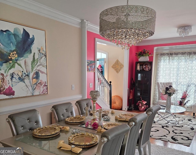 3932 Misty Lk, Ellenwood, GA 30294 - dining space with ornamental molding and a chandelier